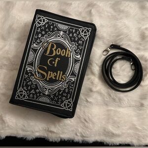 Book of Spells Black and Gold Clutch